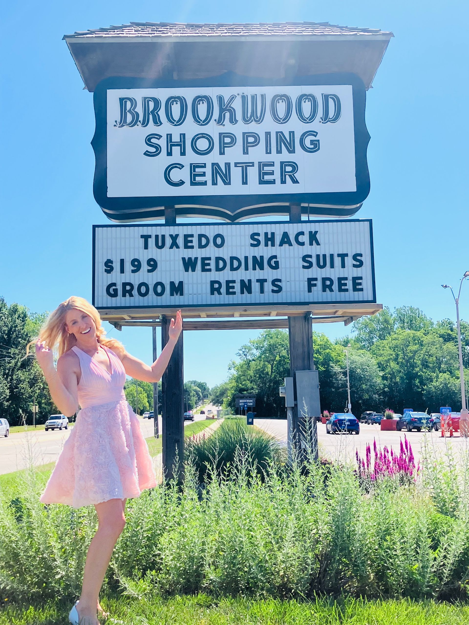Kylie Modeling Topeka Kansas wedding store, tuxedo rental, in Shawnee Kansas at Brookwood shopping center on 29th street and Oakley Avenue.