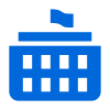 Un bâtiment bleu avec un drapeau au sommet.
