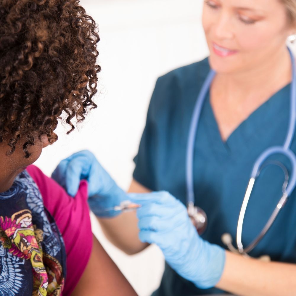 Physician evaluating cold and flu symptoms