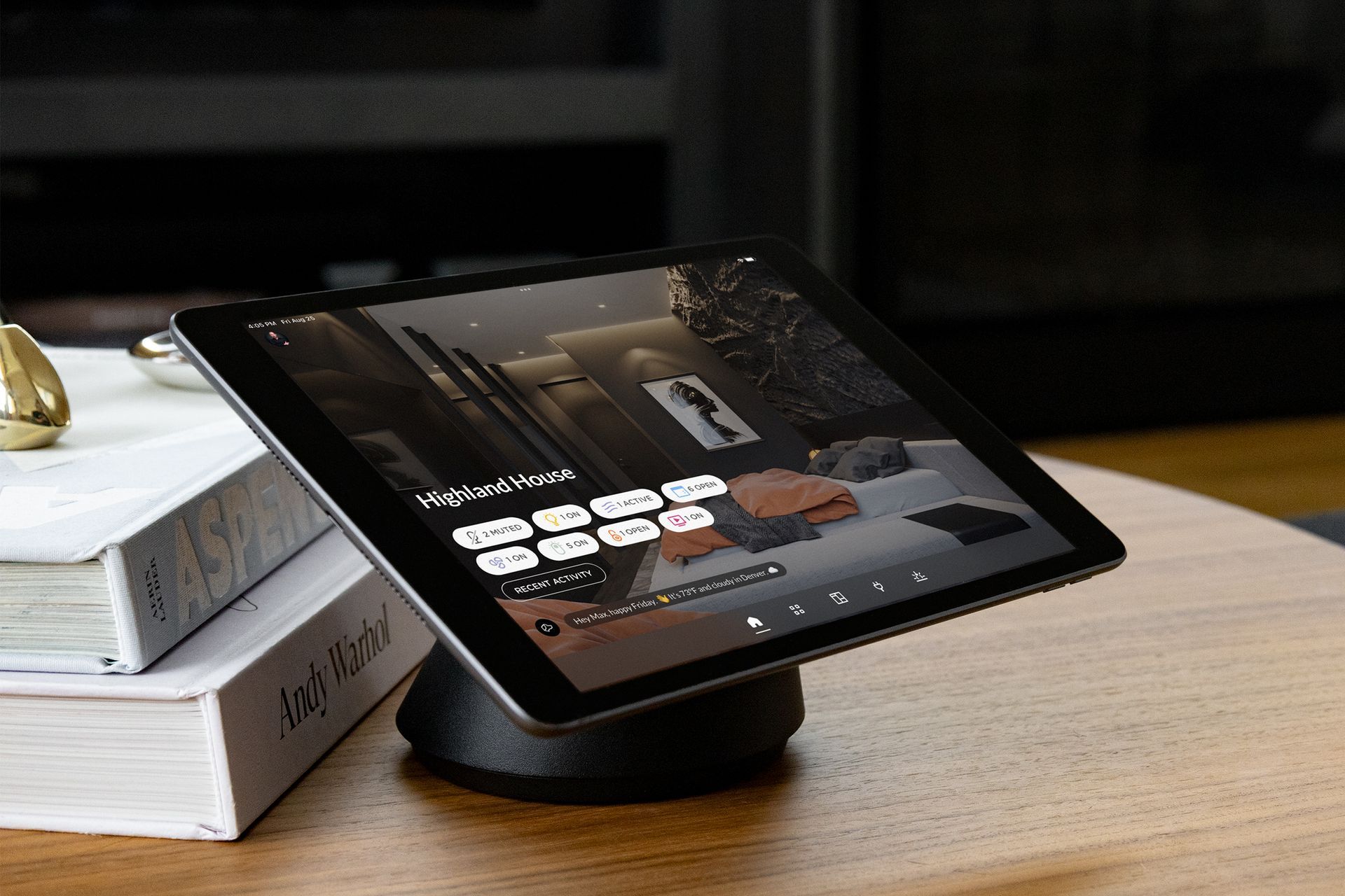 Smart home control system displayed on tablet with touch interface