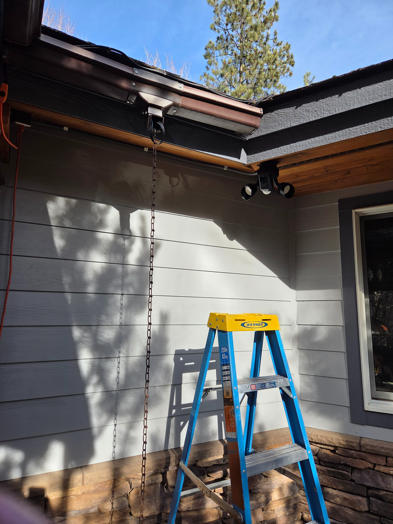 Ring floodlight camera installed on roofline in Stevensville Montana — Smart Home Solutions