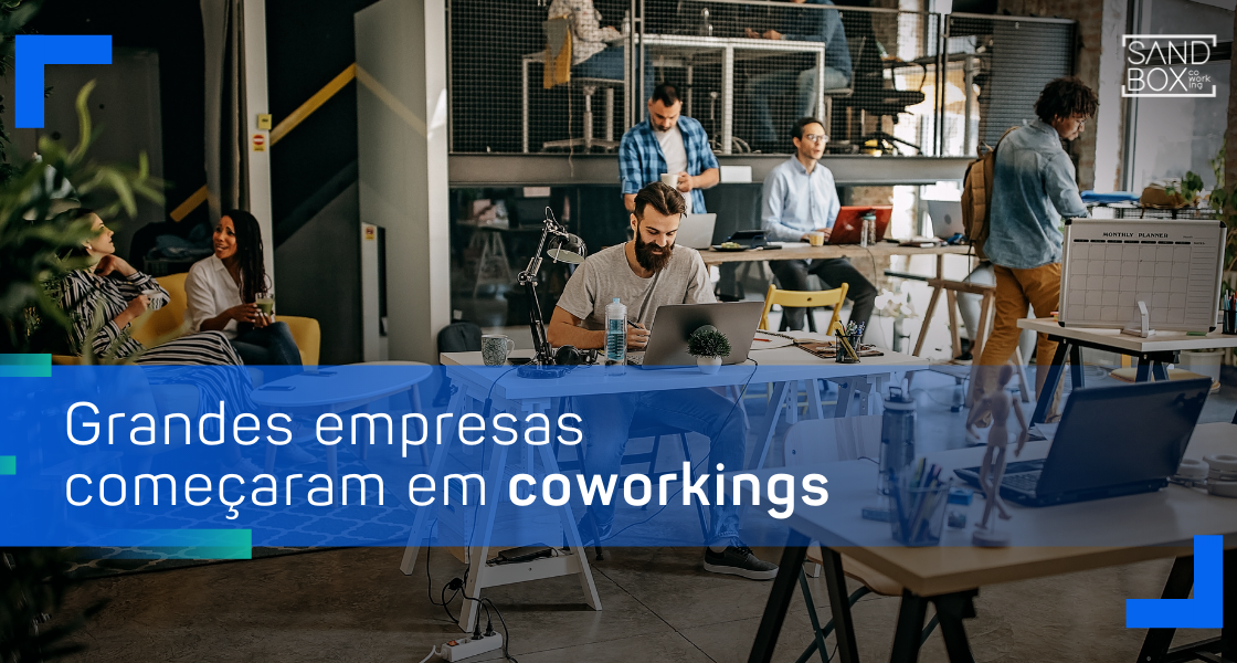 Um grupo de pessoas está trabalhando em um espaço de coworking no Sandbox Coworking