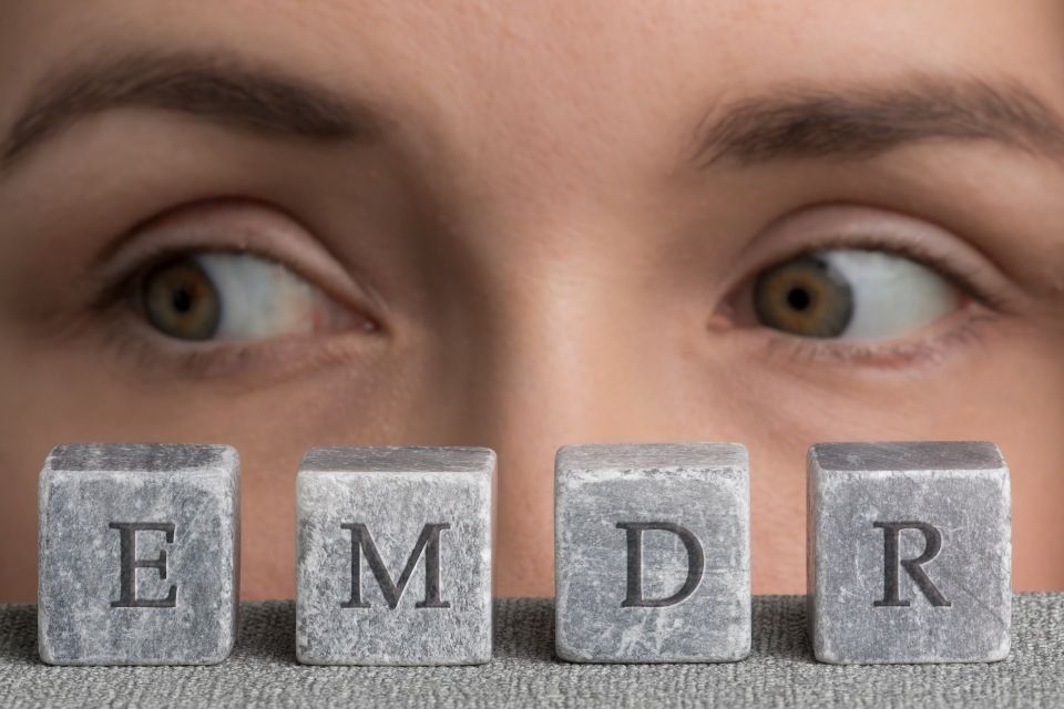 Eyes looking to the side over blocks spelling