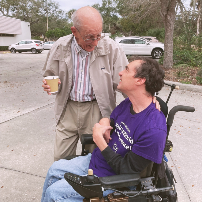 Randy and Man standing at Church