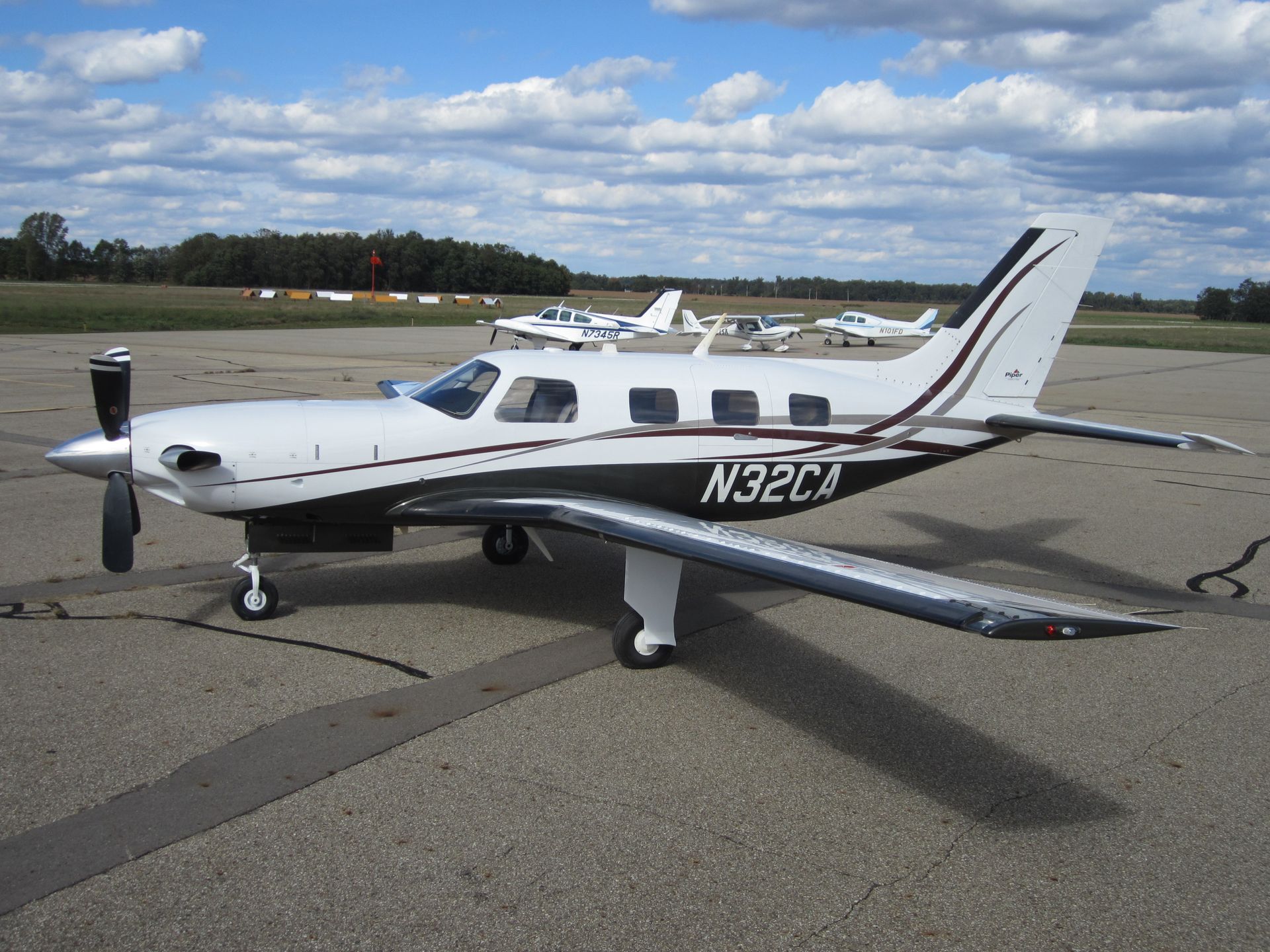 small aircraft on runway N32CA