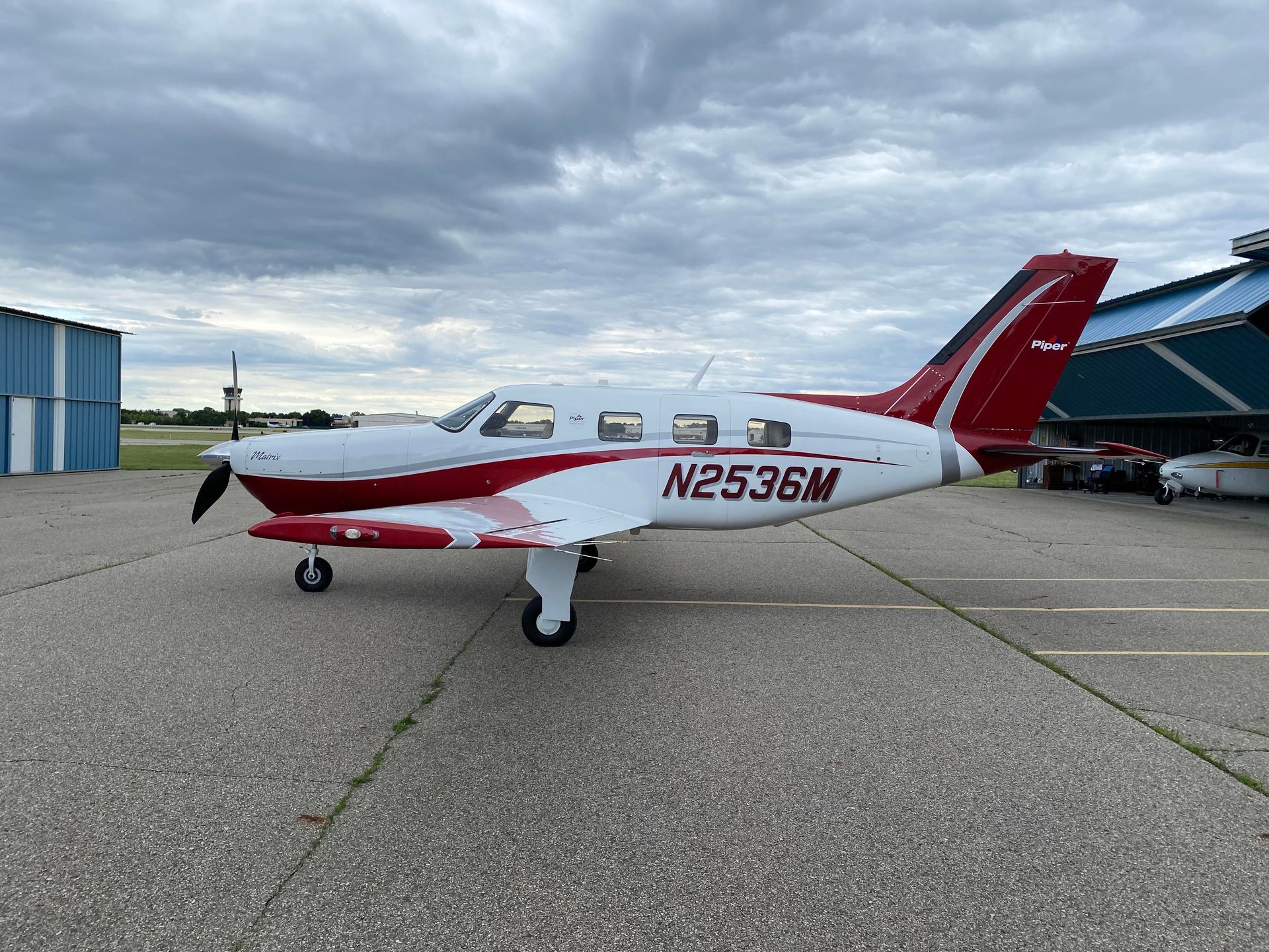 small aircraft by hanger N2536M