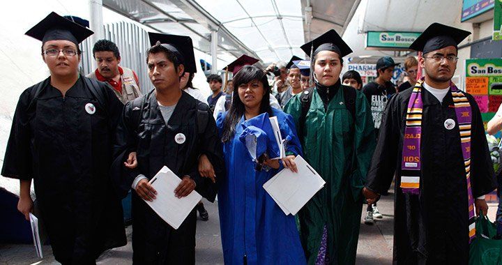 group of people in graduation caps and gowns