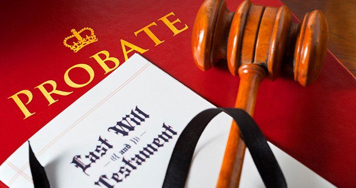 gavel lying on a last will and testament