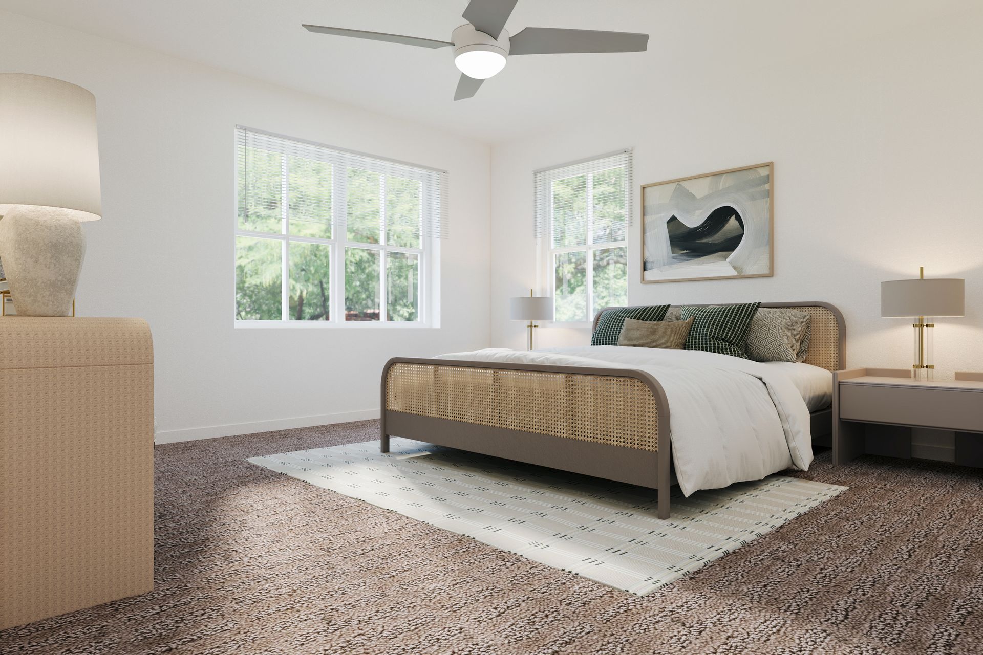 Bright bedroom with a bed, large windows, ceiling fan, lamp, and patterned rug