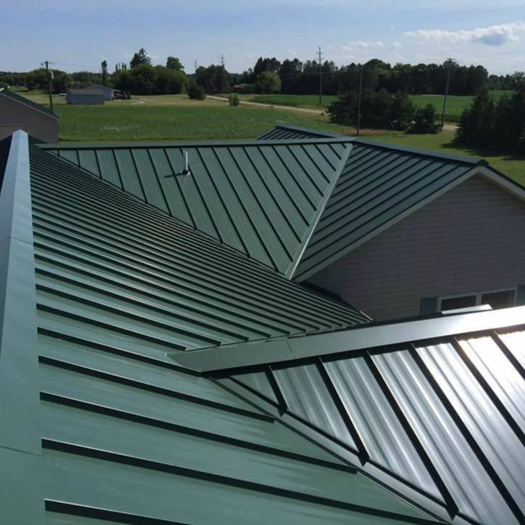 Dark green seam metal roof — Croswell, MI — Parraghi Roofing & Sheet Metal, LLC