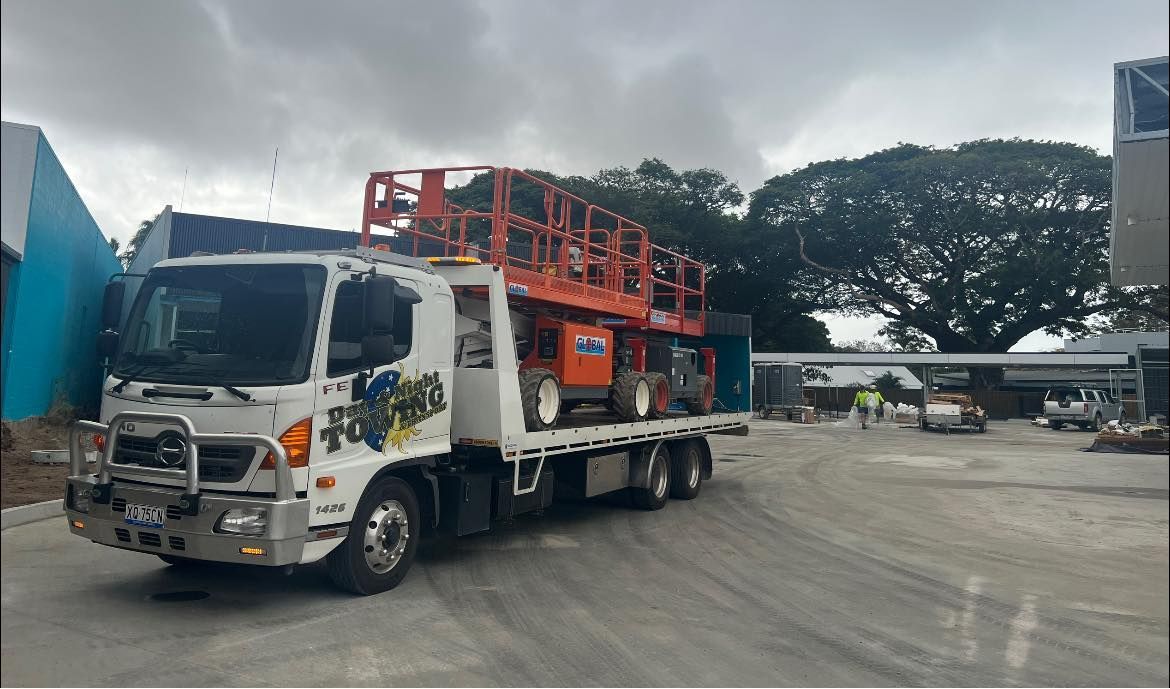 A Tow Truck With A Power Ladder On Top  — Day & Night Towing & Transport In Condon, QLD