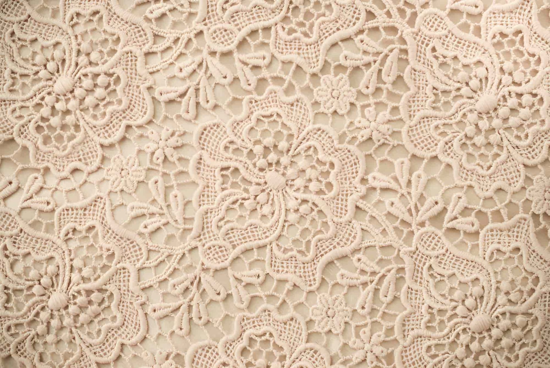 A Close Up Of A White Lace Pattern On A Wall — Gympie Embroidery Services In Southside, QLD
