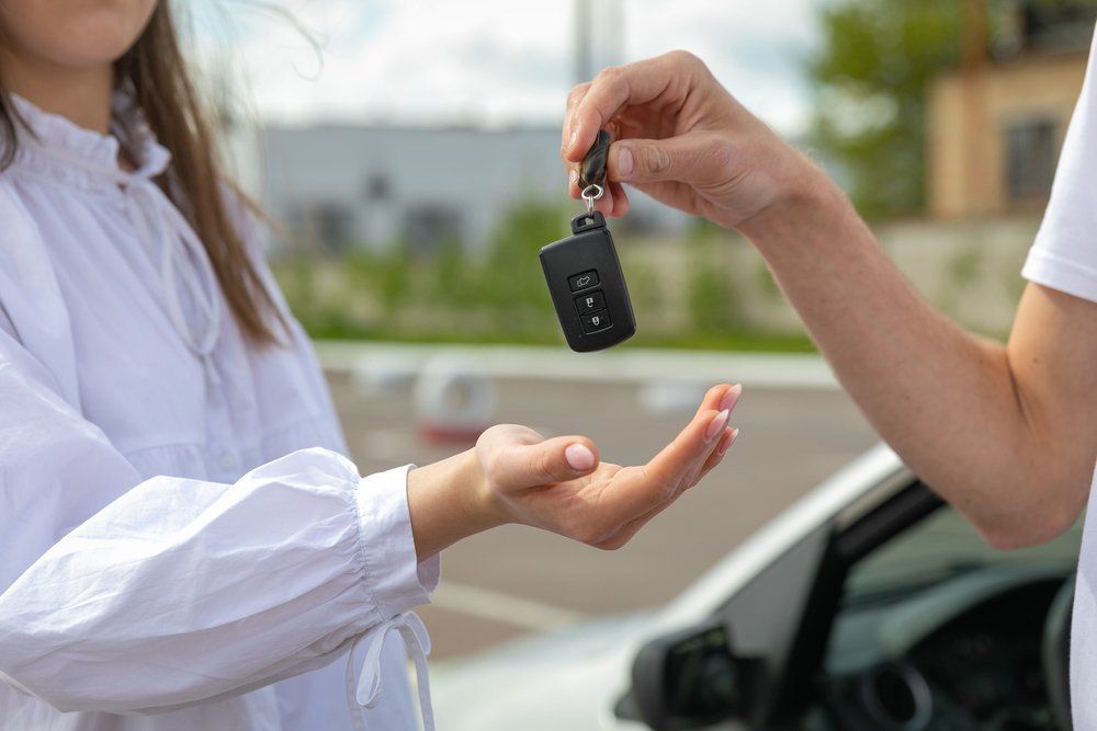 Instructor Giving the Car Key to Student — Blog in Townsville QLD