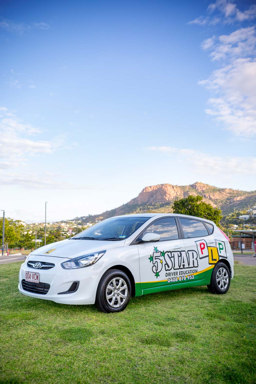 Car Parked at the Field — Driving Lessons in Townsville QLD
