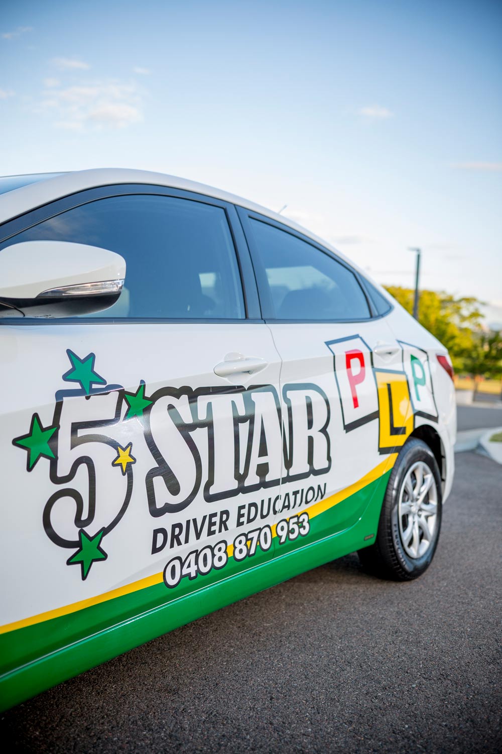 Car Parked at the Road Side View — Driving Lessons in Townsville QLD