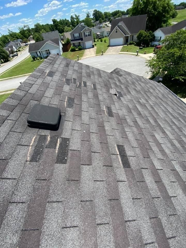Damaged roof that will be replaced by Freedom Contracting. 