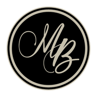 Black circle logo with beige border. Beige script initials