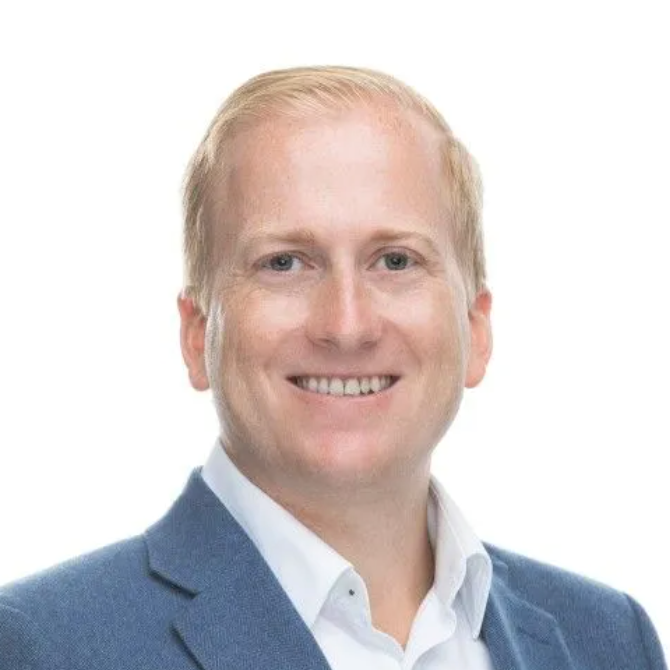 Headshot of Tyler Moore, VP of Strategic Account Management at UASI