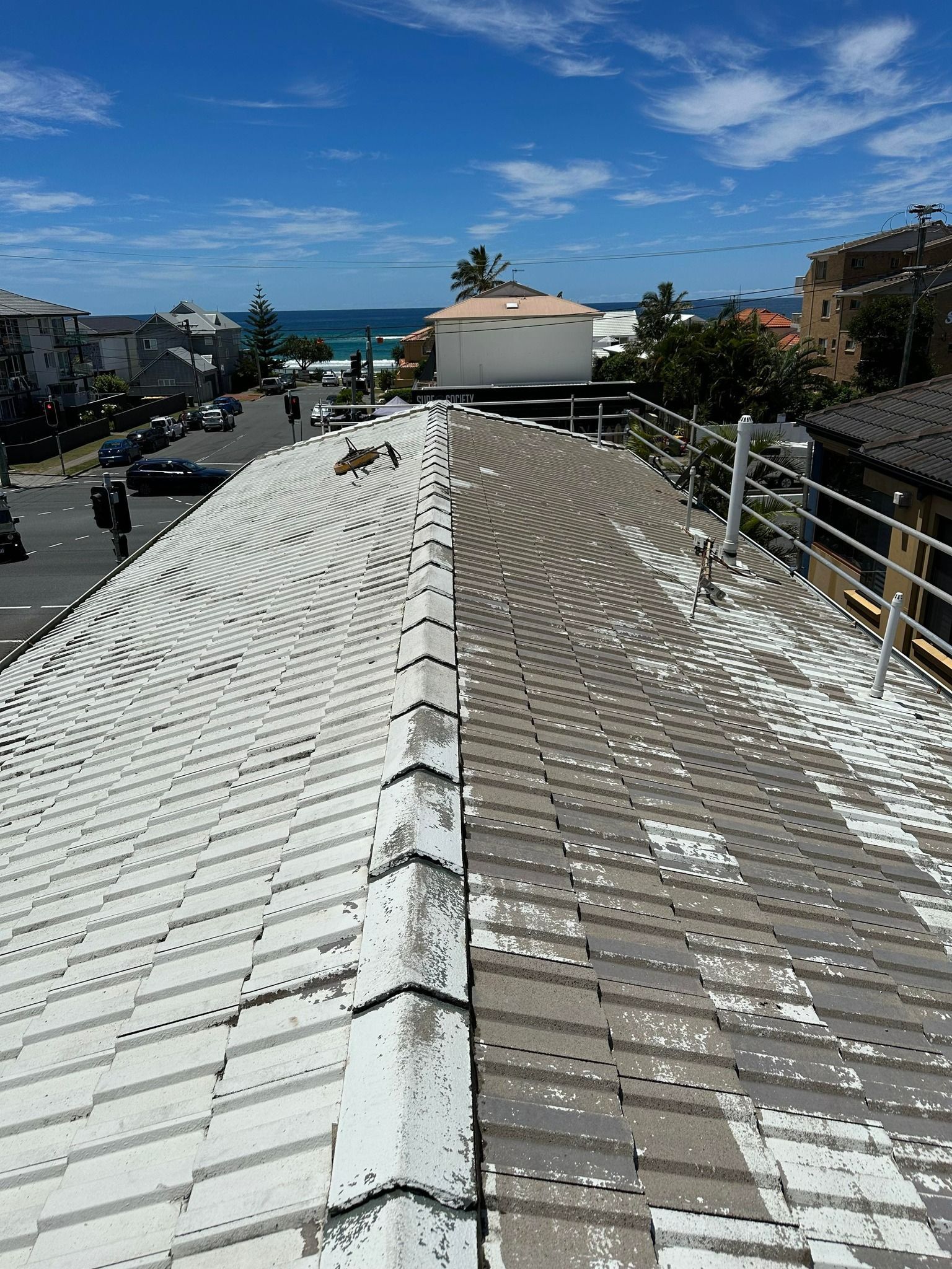A Roof With a Half-cleaned Section — Blast It Pressure Cleaning In Gold Coast, QLD