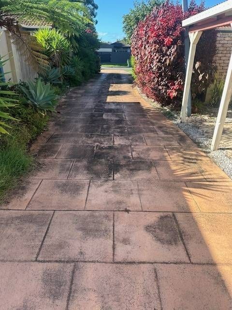 Driveway With Dark Stains — Blast It Pressure Cleaning - Gold Coast In Gold Coast, QLD