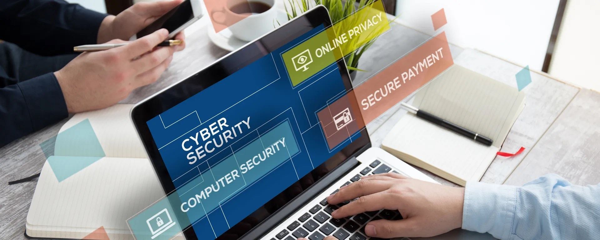 laptop screen showing words cyber security related words on screen