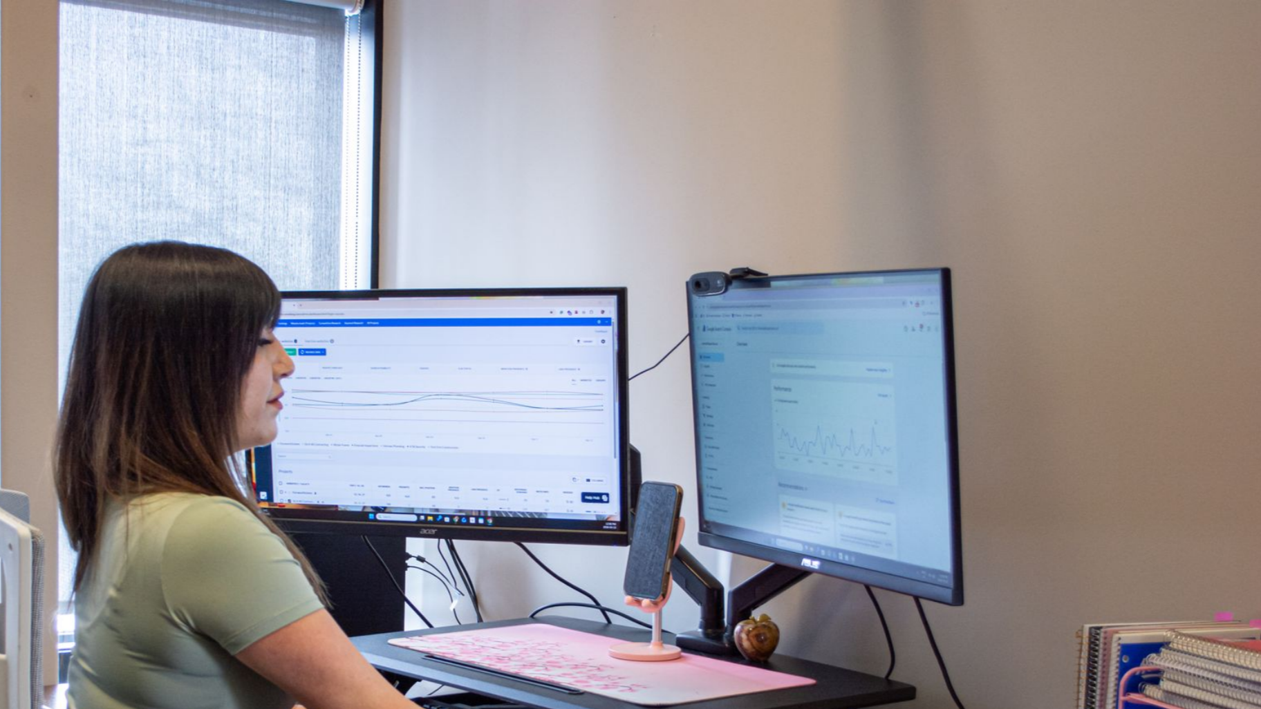 Woman sitting in front of her computer working.