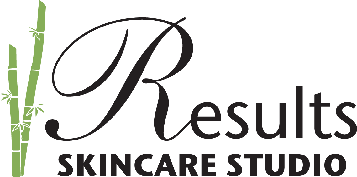 A logo for results skincare studio with bamboo sticks in the background.