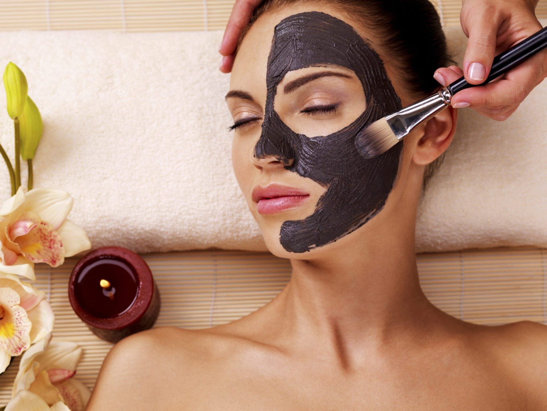 A woman is getting a facial at Results Skincare Studio in Fort Myers