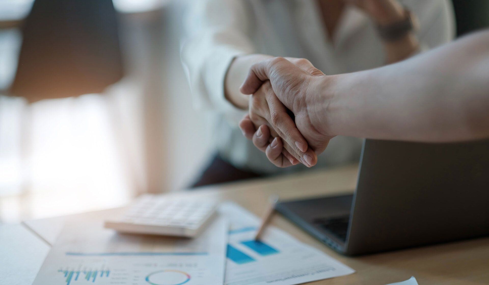 Photo of people shaking hands