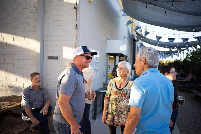 Jay Bramble head of sales talks to Lighthouse Customers at an open house event at the brewtorium in Austin Texas.