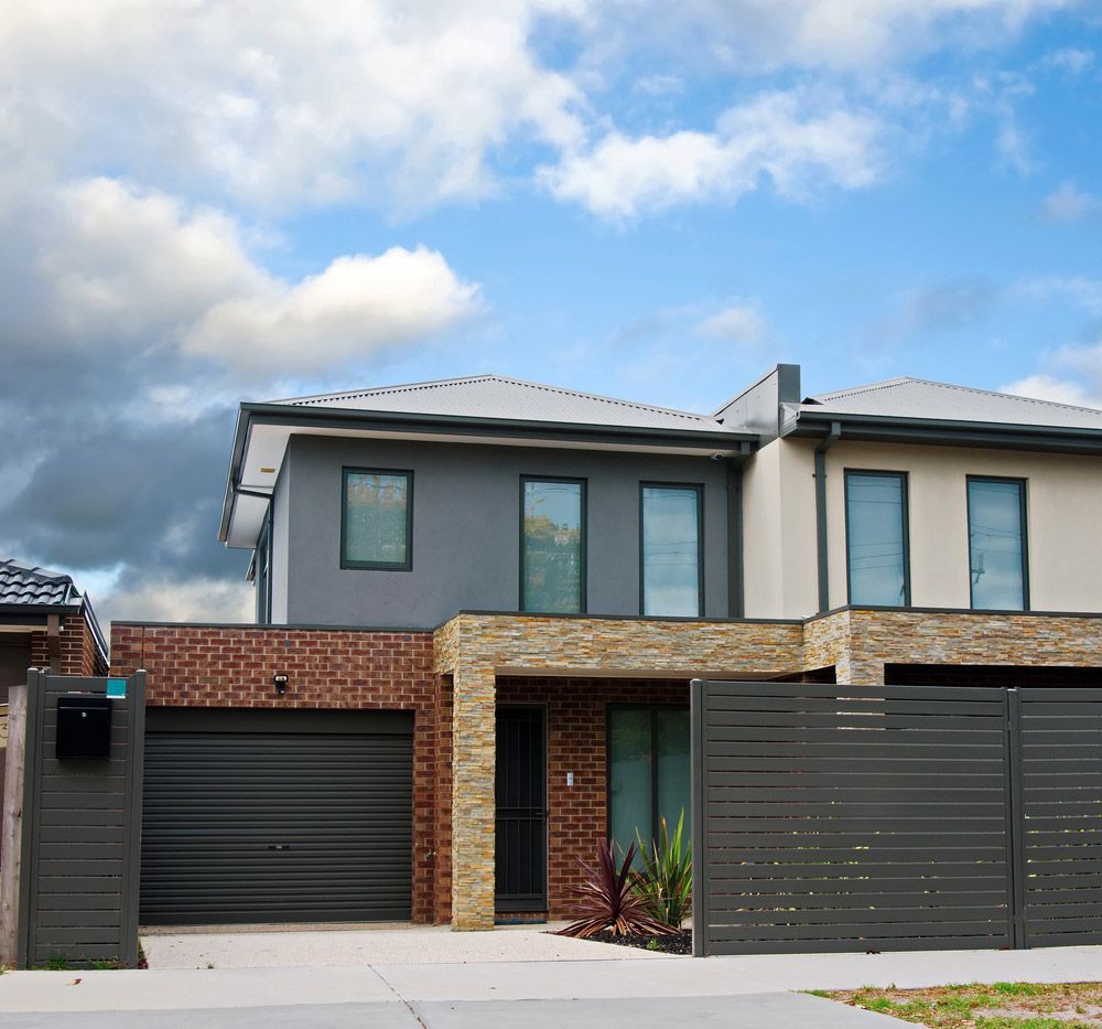 Residential House With Garage — Professional Roofer in Alice River, QLD