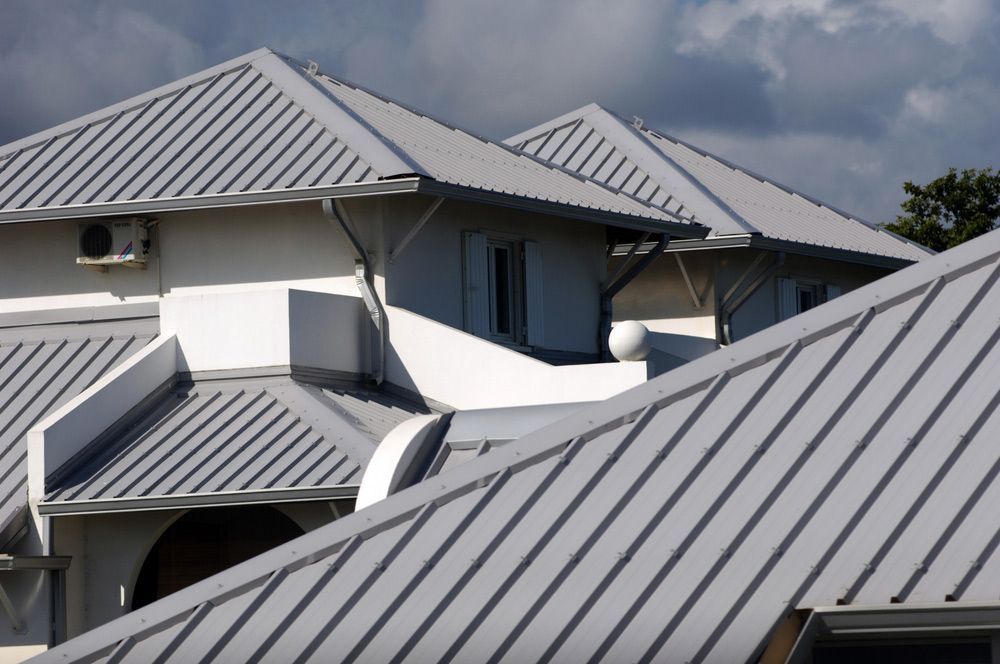 Using Nail Gun In Installing Shingle — Professional Roofer in Alice River, QLD