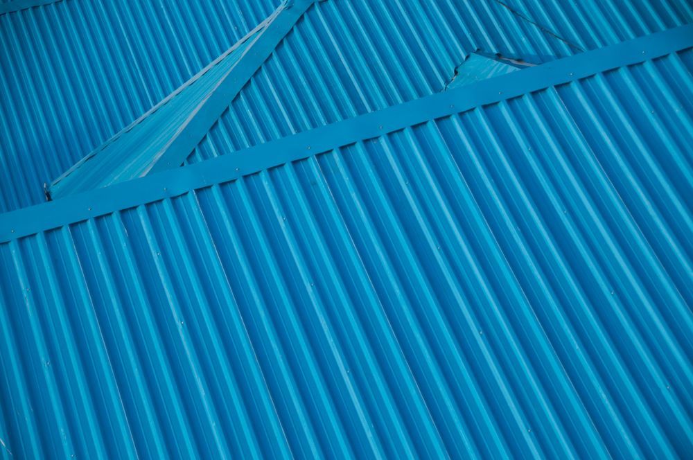 Blue roof— Professional Roofer in Alice River, QLD