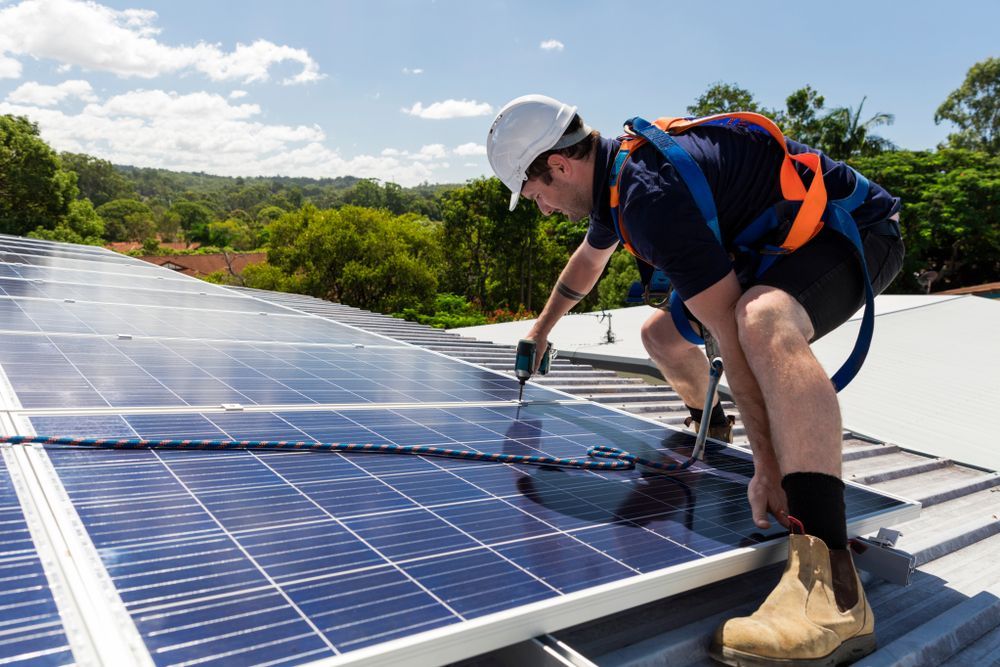 A House With Solar Panels on the Roof — SEP Electrical Pty Ltd in Towradgi, NSW