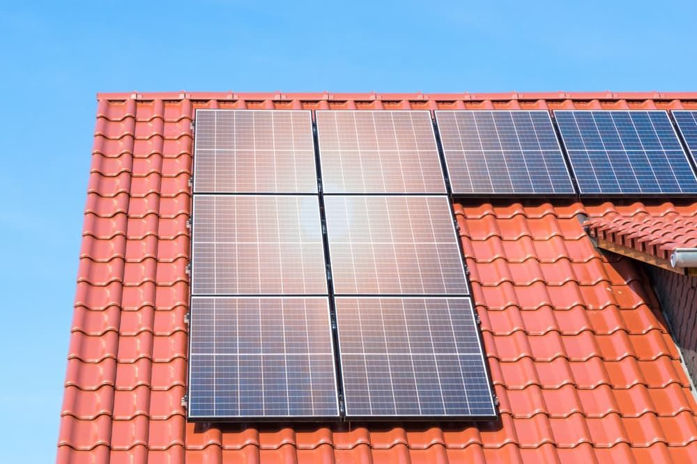 There Are Many Solar Panels on the Roof of a House — SEP Electrical Pty Ltd in Albion Park, NSW