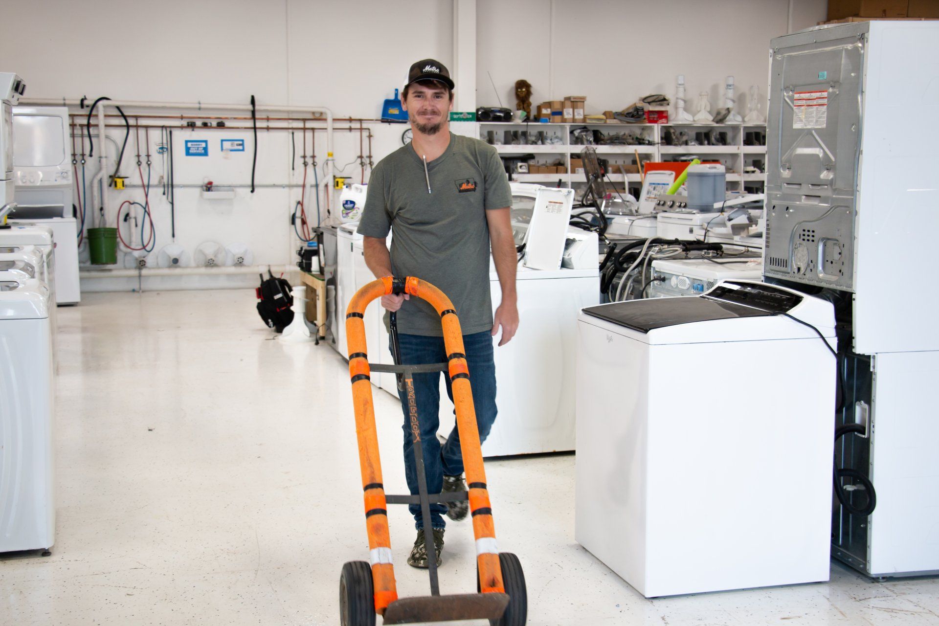 technician in a store specializing in refurbished appliances. 