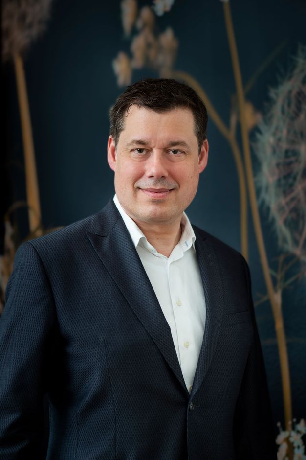 Bild vom Firmengründer John Corona von Osmond