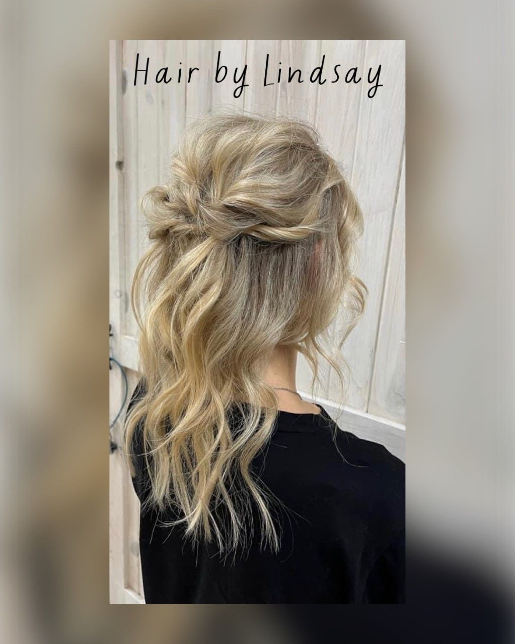 Blonde half-up twisted hairstyle with loose waves, shown from the back against a light background