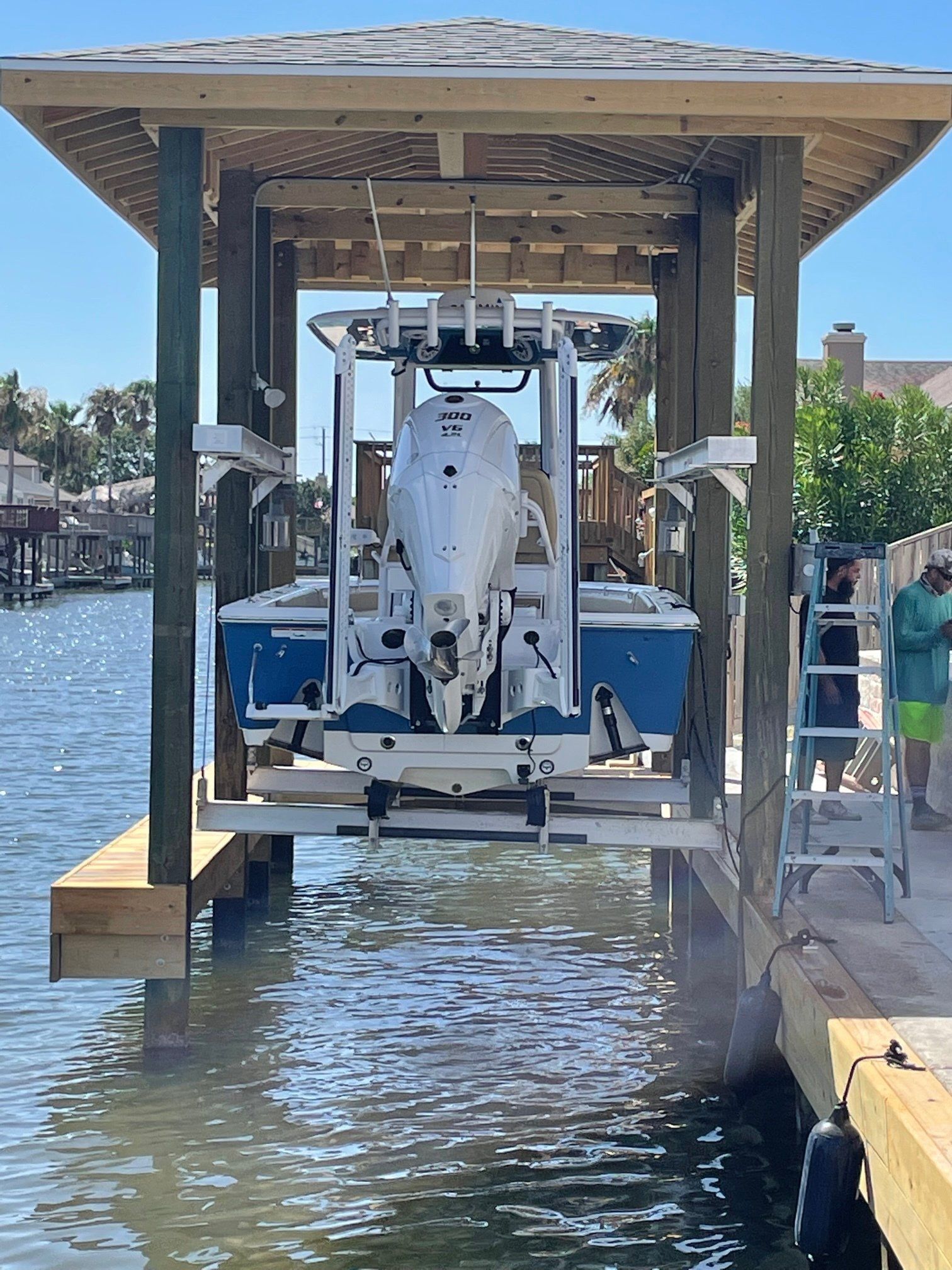 Boat Lift Beside The Dock | Corpus Christi, TX | D & D Decks & Docks