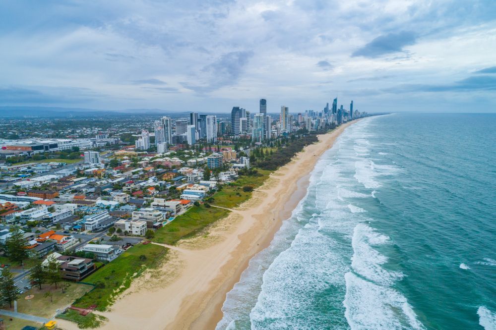 An Aerial View of a Beach With a City in the Background — Scott Graham Building Services In Mermaid Beach, QLD