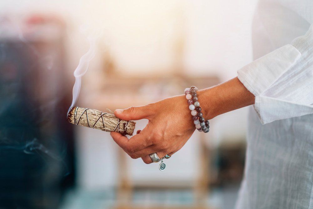 Burning smoking sage smudge stick — Naturopath in Hervey Bay QLD