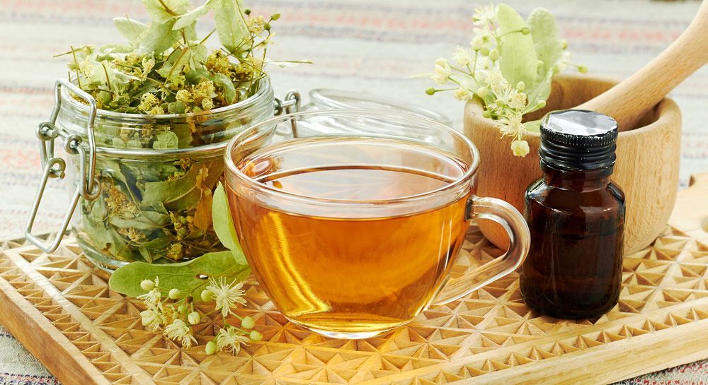 Linden Herbal Tea With Lime Tree Bloom And Glass Can With Dried Herb — Julie Taylor Naturopath in Hervey Bay, QLD