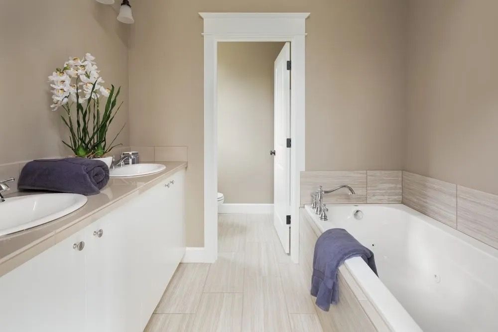 A Bathroom With Two Sinks And A Bathtub — Damn Fine Constructions In Nambucca Heads, NSW