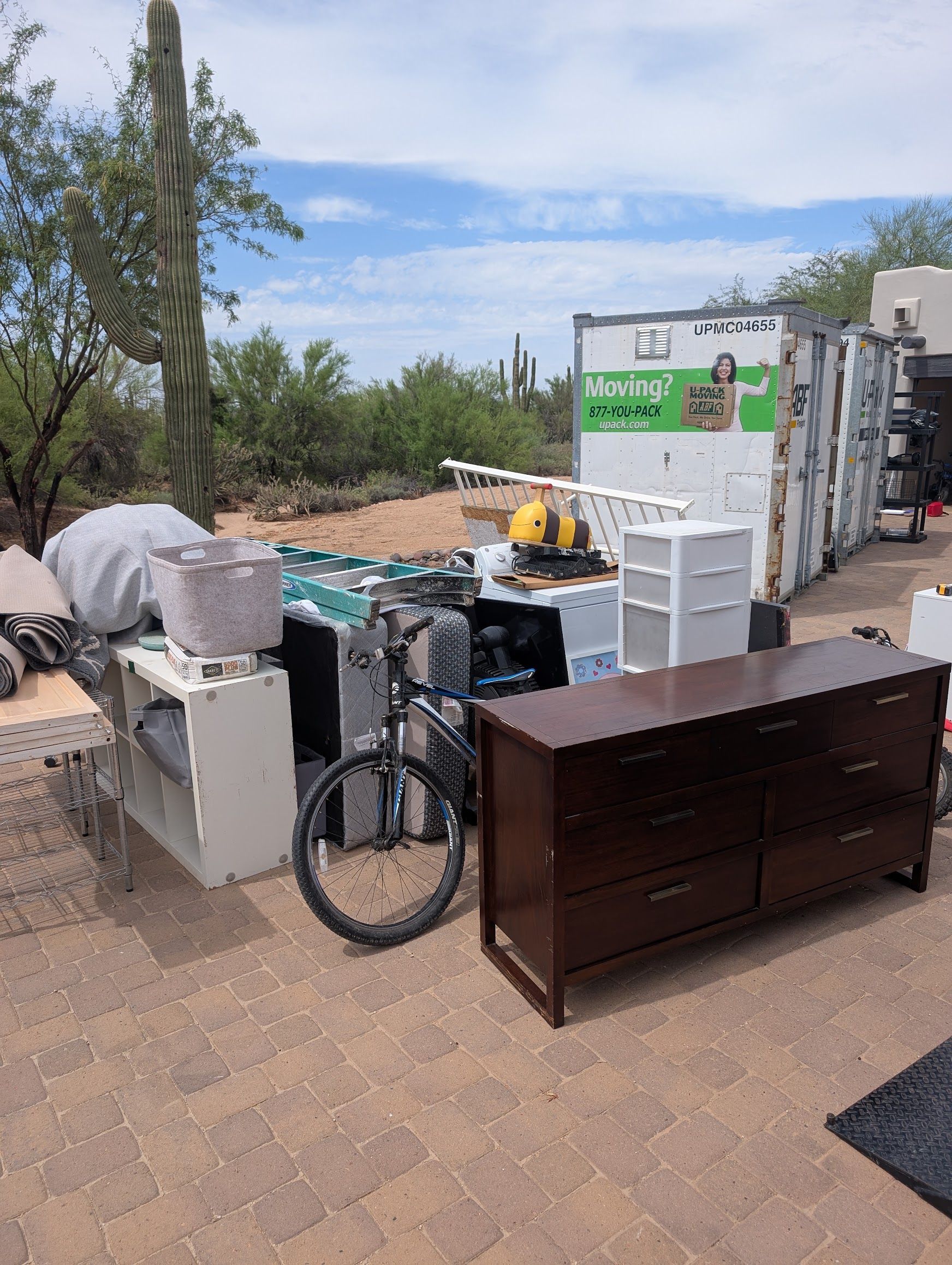 Real Scottsdale junk removal price comparison job near 66th Street and Dove Valley Road