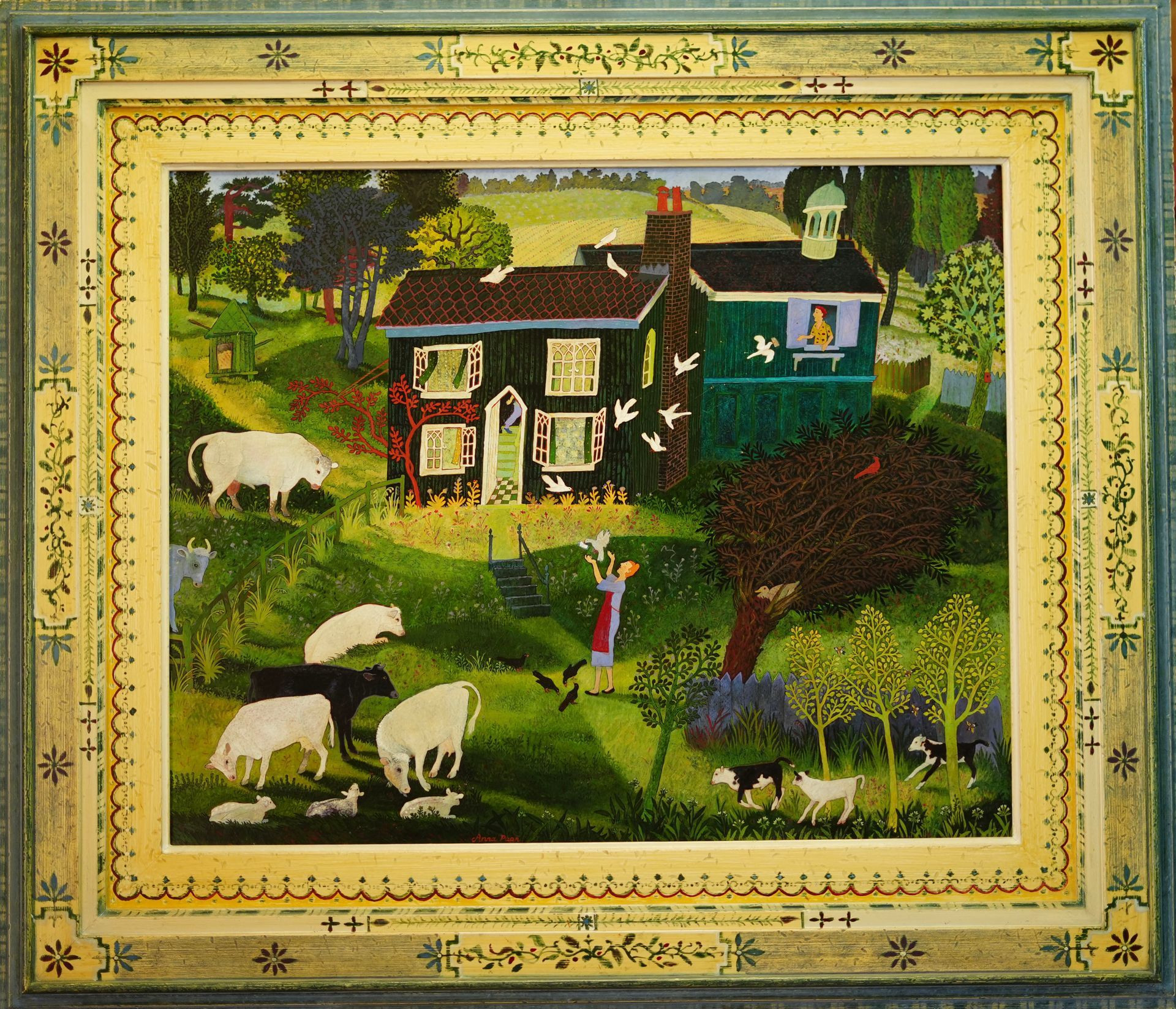 Farmhouse scene, sheep graze in a grassy yard, woman walks by with birds and trees, green and brown buildings.