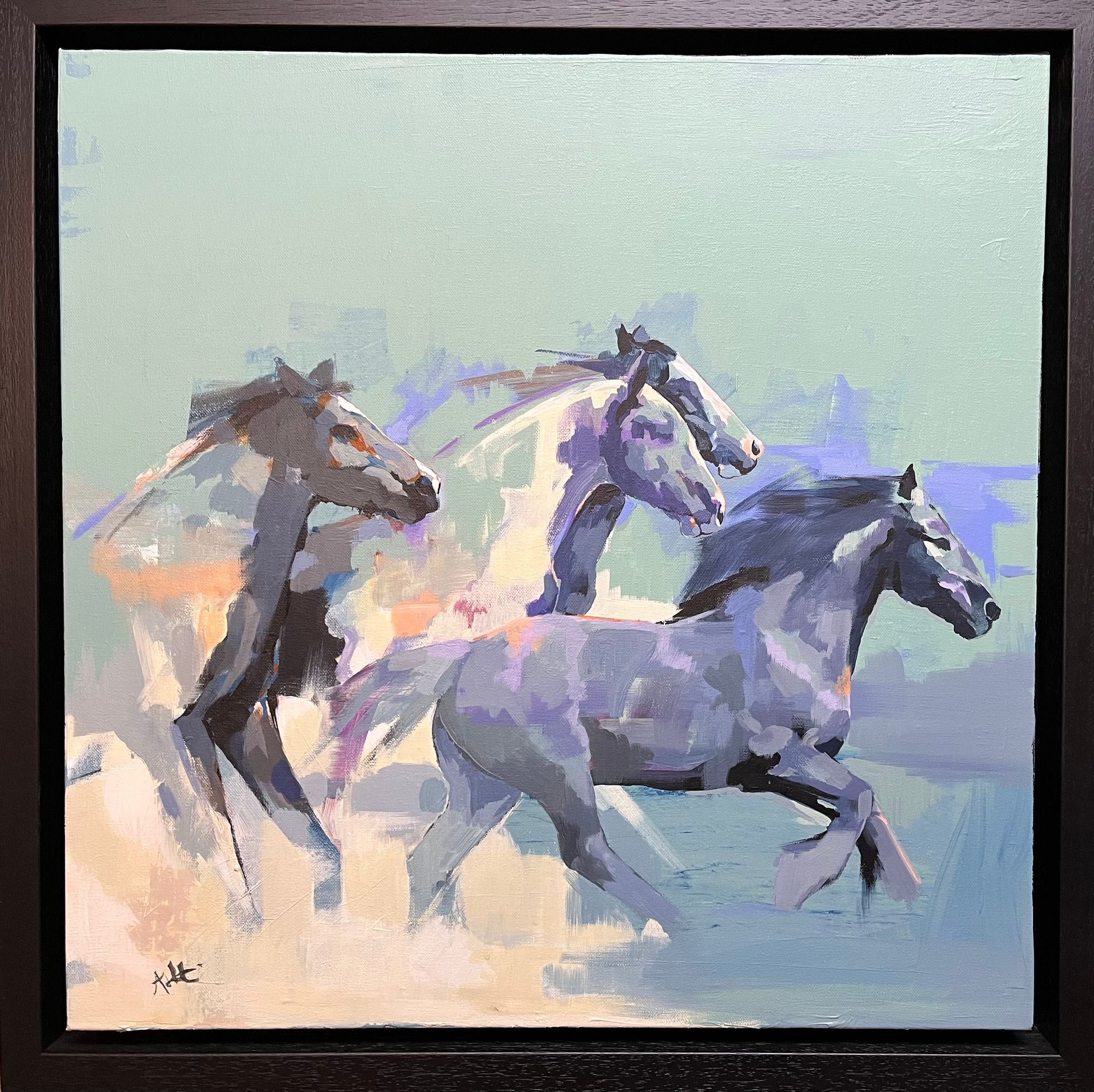 Horses running across a plain; blue, purple, and cream colors with a soft-focus effect.