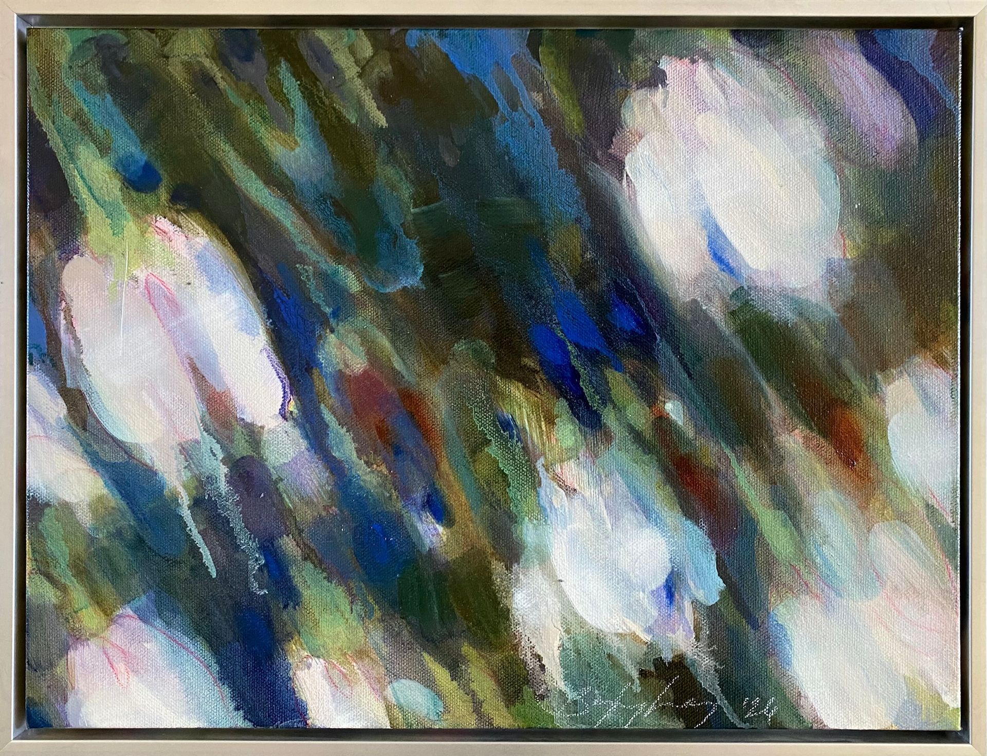 Abstract painting with blurred blue, green, and white brushstrokes in a framed canvas