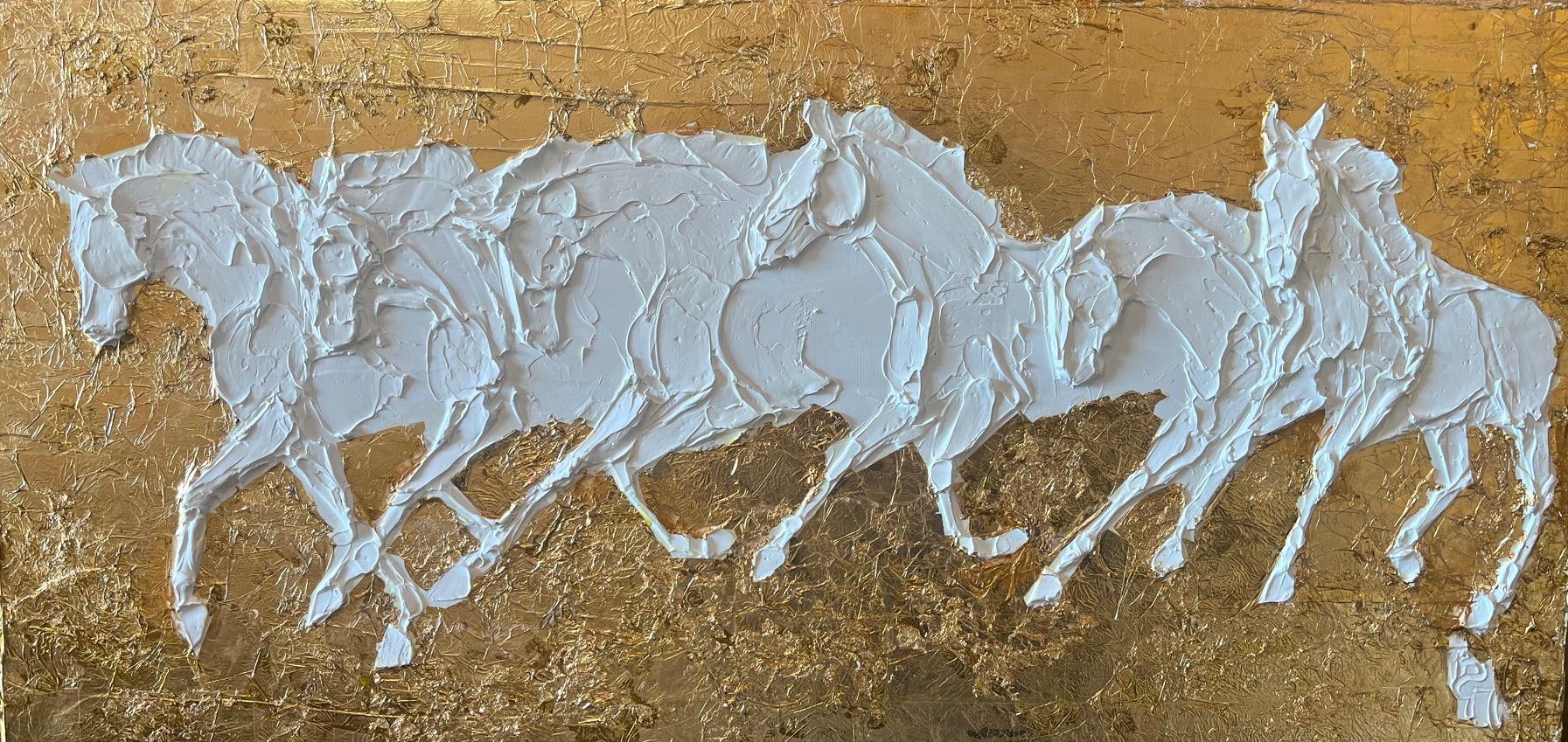 A painting of a herd of horses running on a gold background.