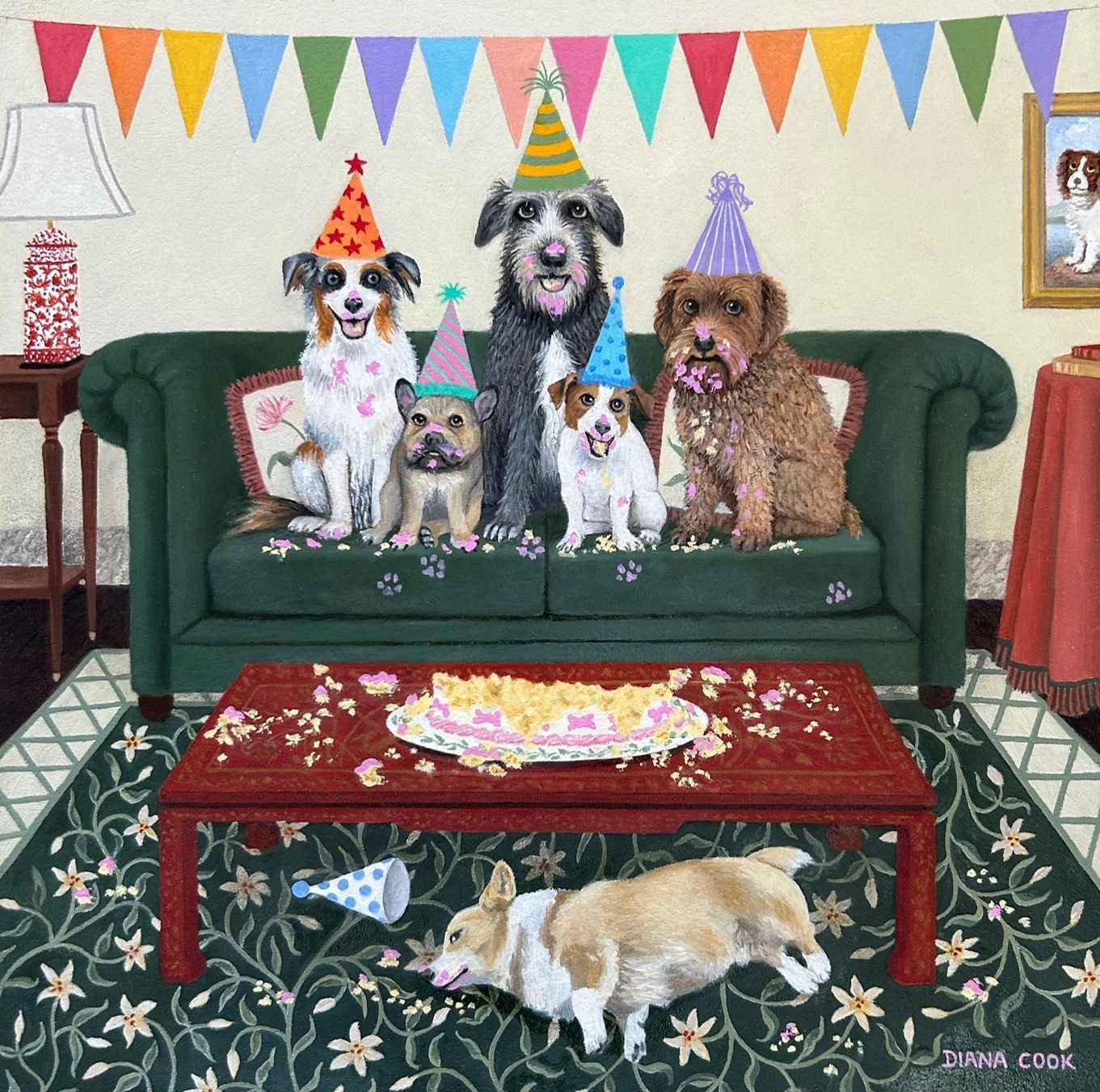 A group of dogs wearing party hats are sitting on a couch