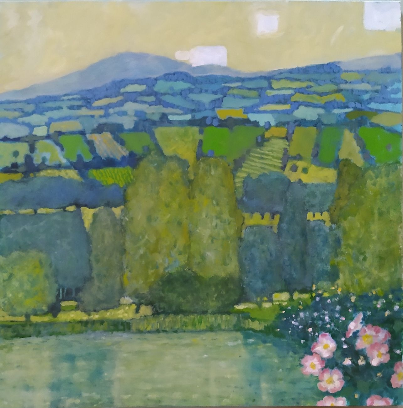 Landscape painting of rolling green hills, trees, and a calm body of water with pink flowers; muted colors.